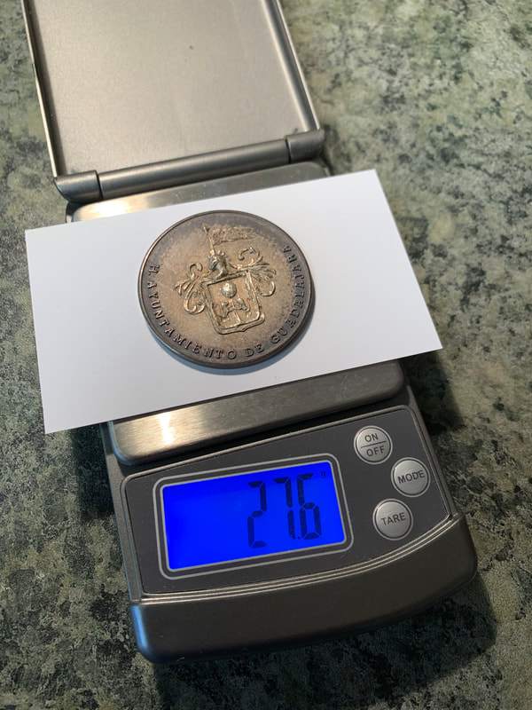 Weighing as part of authenticity verification